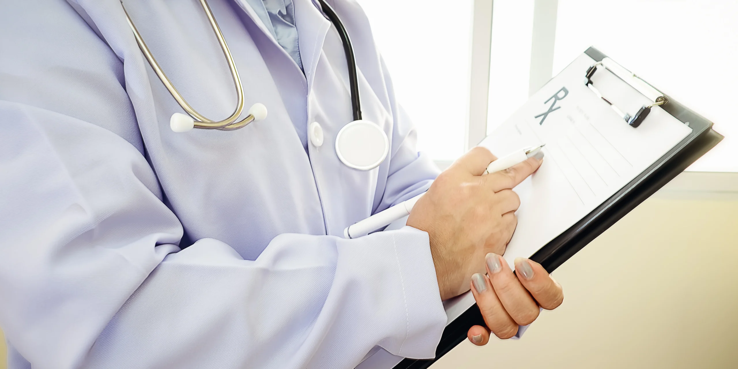 Doctor holding a prescription clipboard and stethoscope, symbolizing Alprazolam Xanax medical guidance.